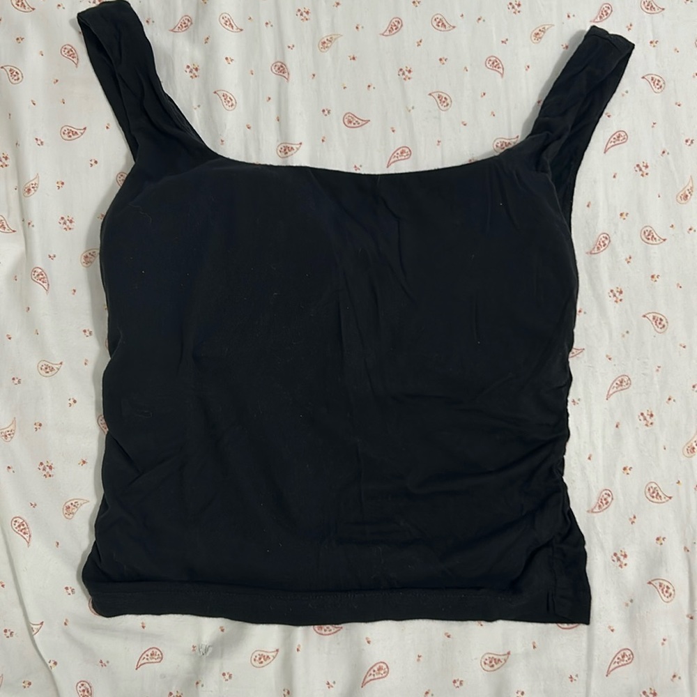 Brand is OGL. Size medium in women’s